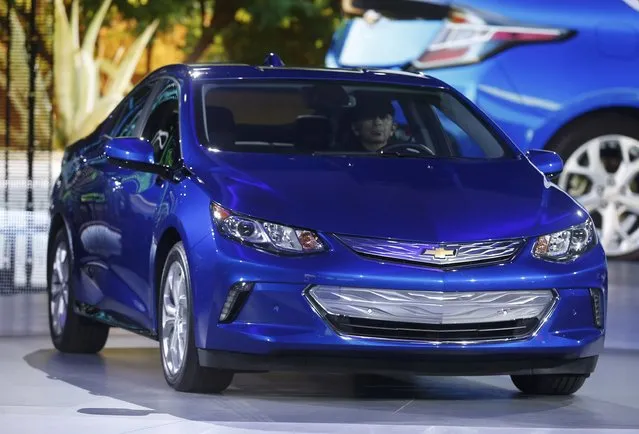 The 2016 Chevrolet Volt hybrid is unveiled during the first press preview day of the North American International Auto Show in Detroit, Michigan January 12, 2014. (Photo by Rebecca Cook/Reuters)