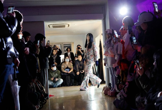 A model presents a creation from the 2025 Autumn/Winter collection by Japanese designer Lim Asafuji for the label “Pays des Fees” during Tokyo Fashion Week in Tokyo, Japan, 19 March 2025. The presentation of the 2025 Autumn/Winter collections runs from 17 to 22 March 2025. (Photo by Franck Robichon/EPA/EFE)