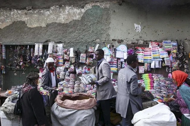 Vendors sell goods at the Mercato market in Addis Ababa June 13, 2015. (Photo by Tiksa Negeri/Reuters)