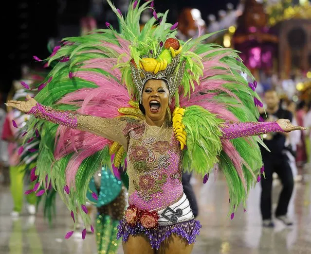 A reveller from the Mangueira samba school participates in the annual carnival parade in Rio de Janeiro's Sambadrome, February 15, 2015. (Photo by Sergio Moraes/Reuters)
