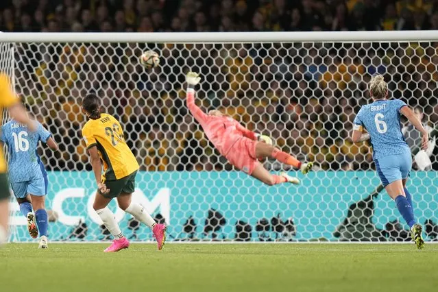 Australia's Sam Kerr scores her side's opening goal during the Women's World Cup semifinal soccer match between Australia and England at Stadium Australia in Sydney, Australia, Wednesday, August 16, 2023. (Photo by Alessandra Tarantino/AP Photo)