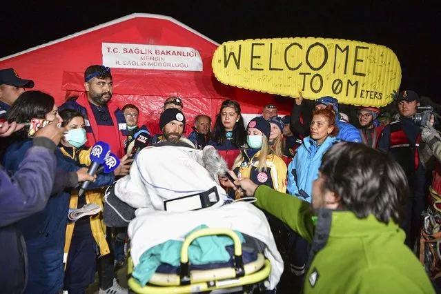American researcher Mark Dickey, center, talks to journalists after being pulled out of Morca cave near Anamur, south Turkey, on early Tuesday, September 12, 2023, more than a week after he became seriously ill 1,000 meters (more than 3,000 feet) below its entrance. Teams from across Europe had rushed to Morca cave in southern Turkey's Taurus Mountains to aid Dickey, a 40-year-old experienced caver who became seriously ill on Sept. 2 with stomach bleeding. (Photo by Mert Gokhan Koc/Dia Images via AP Photo)