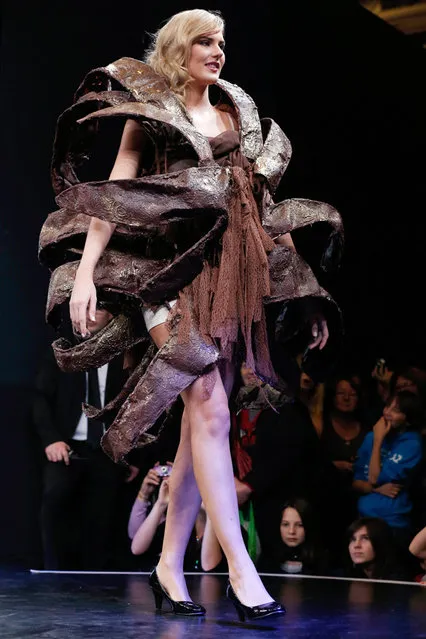 A model presents chocolate dress during the Paris Chocolate fair (Salon du Chocolat) on October 30, 2013. The fair's 2013 edition will run from October 30 until November 3. (Photo by Thomas Samson/AFP Photo)