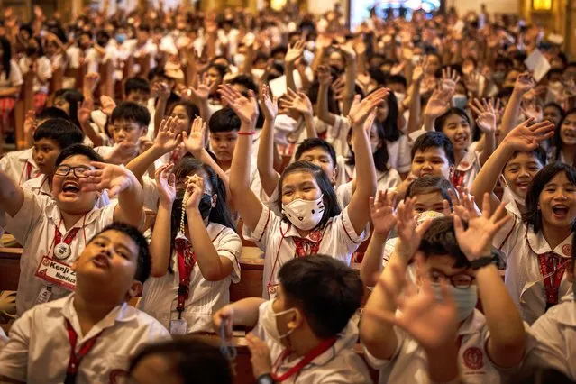 Filipino children cheer after taking part in the “One Million Children Praying the Rosary for Unity and Peace” campaign, at the Immaculate Concepcion Cathedral of Pasig on October 18, 2023 in Pasig, Metro Manila, Philippines. Hundreds of thousands of children across the world participated in the “One Million Children Praying the Rosary for Unity and Peace” campaign, spearheaded by the Aid to the Church in Need (ACN), with prayers for peace amid the Israel-Hamas conflict being one of the focal intentions. (Photo by Ezra Acayan/Getty Images)