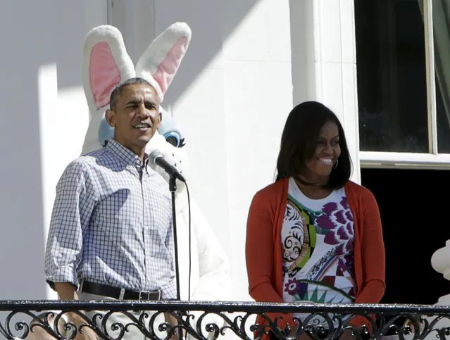 U.S. President Barack Obama and first lady Michelle Obama greet participants before the annual White House Easter Egg Roll in Washington April 6, 2015. (Photo by Gary Cameron/Reuters)