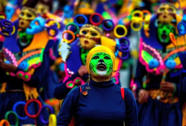 Revellers take part in the “Canto a la Tierra” parade on January 3, 2019, during the Blacks and Whites Carnival in Pasto, Colombia, the largest festivity in the southwestern region of the country. More than 10,000 artists, craftsmen and revellers take part in the Black and White Carnival, which has its origins in a mix of Andean, Amazonian and Pacific cultural expressions. It is celebrated every year from January 2 to 6 in the city of Pasto and has been on UNESCO's list of intangible cultural heritage since 2009. (Photo by Juan Barreto/AFP Photo)