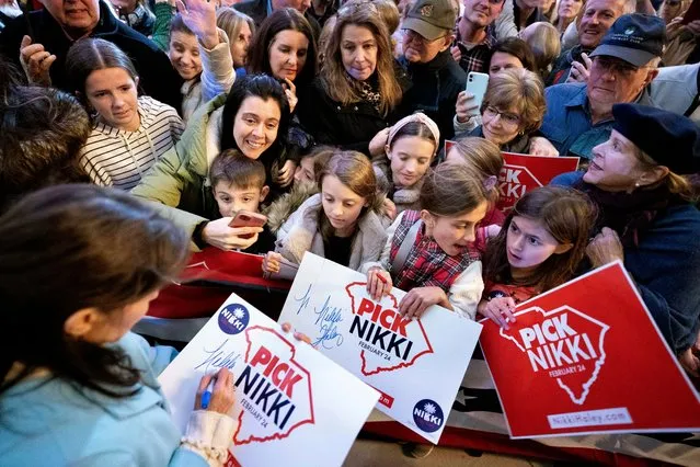 Republican presidential candidate Nikki Haley signs autographs for supporters at the end of a campaign event at New Realm Brewing Co., Sunday, February 4, 2024, in Charleston, S.C. (Photo by Sean Rayford/AP Photo)
