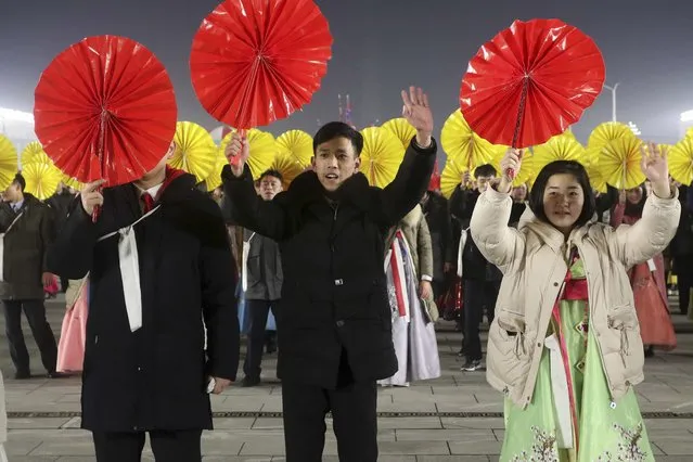 People attend the New Year's eve gala of youth and students at Kim Il Sung Square in Pyongyang, North Korea Sunday, December 31, 2023. (Photo by Jon Chol Jin/AP Photo)