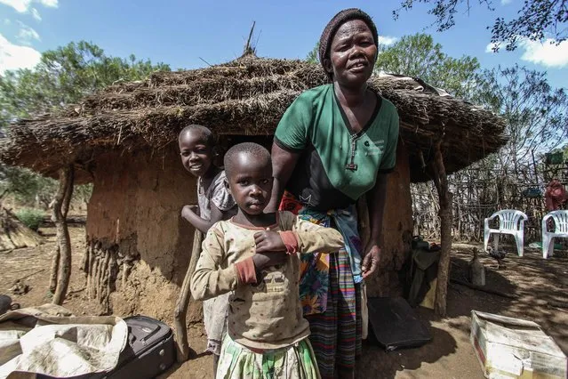 Marta and her children in Napak district, Karamoja, Uganda, February, 2017. (Photo by Sumy Sadurni/Barcroft Images)