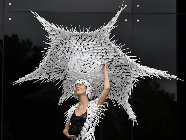 Horse Racing - Royal Ascot - Ascot Racecourse - 17/6/15
Racegoer Larisa Katz poses with her own hat design made from recycled plastic spoons as she attends the second day of racing
Reuters / Toby Melville
Livepic
