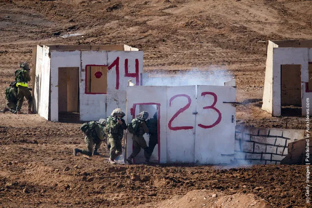 Israeli soldiers take part in an army exercise on at the Shizafon army base, in the Negev Desert north of the southern city of Eilat