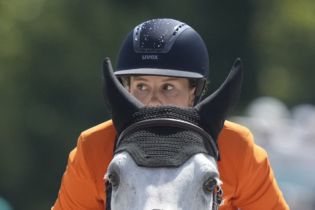 Netherlands' Kim Emmen, riding Imagine, during the Equestrian Team Jumping competition, at the 2024 Summer Olympics, Thursday, August 1, 2024, in Versailles, France. (Photo by Mosa'ab Elshamy/AP Photo)