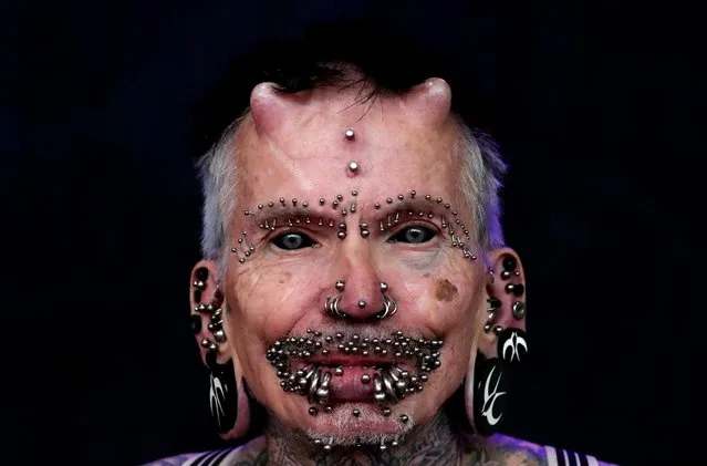 Rolf Buchholz of Germany, who says that he is holding the world record with his 480 piercings, poses during the 2019 International Brussels Tattoo Convention in Brussels, Belgium on November 8, 2019. (Photo by Yves Herman/Reuters)