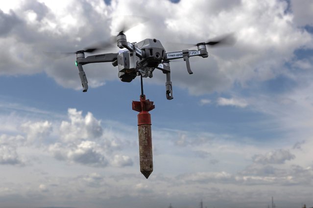 Ukrainian military learn to fly drones with bombs attached at a special school on May 12, 2023 in Lviv region Ukraine. The school is funded by KOLO, a Ukranian foundation running a pilot school of drones and UAV's for the military. Drones are essential in the war effort now for many reasons, instructors are in demand as the effort continues to train more military, police and special forces. (Photo by Paula Bronstein/Getty Images)