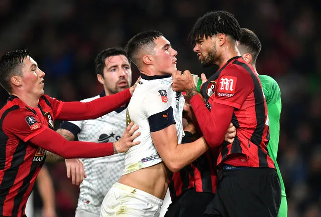 Philip Billing of AFC Bournemouth clashes with Lloyd Jones of Luton Town during the FA Cup Third Round match between AFC Bournemouth and Luton Town at Vitality Stadium on January 04, 2020 in Bournemouth, England. (Photo by Dan Mullan/Getty Images)