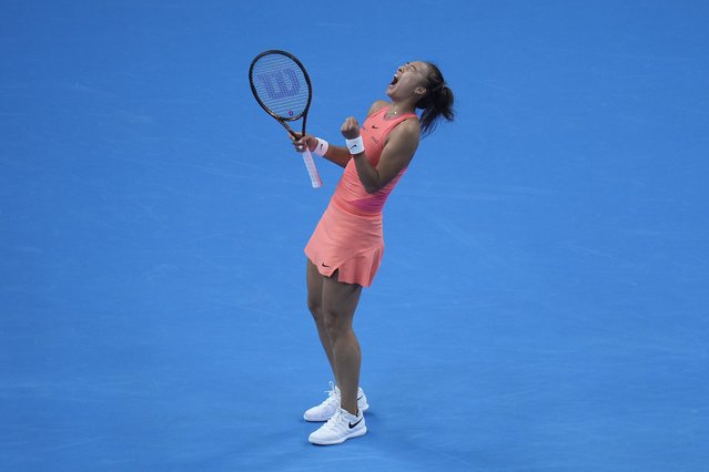 Zheng Qinwen of China celebrates after defeating Mirra Andreeva of Russia in the women's singles quarterfinals match of the China Open tennis tournament, at the National Tennis Center in Beijing, Friday, October 4, 2024. (Photo by Andy Wong/AP Photo)