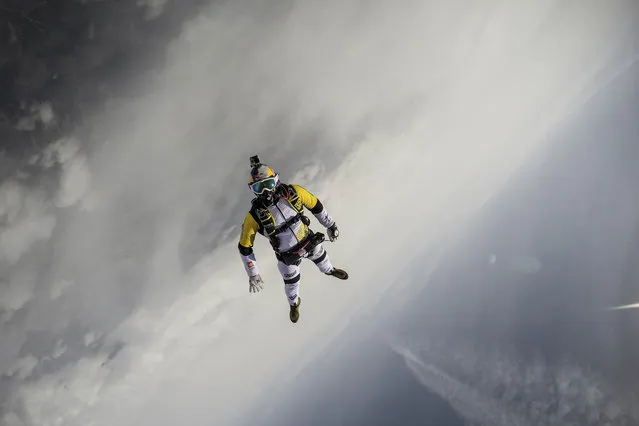 Fred Fugen seen training for a jump over Austria on May 12, 2014. Fearless skydivers jump from an altitude of 10,000 meters above the largest mountain in Europe. Frederic Fugen, 34, and Vincent Reffet, 29, leapt from a plane in the freezing skies above Mont-Blanc in the French Alps. The jump is from such a height the pictures show the curvature of the earth. (Photo by Dominique Daher/Barcroft Media)