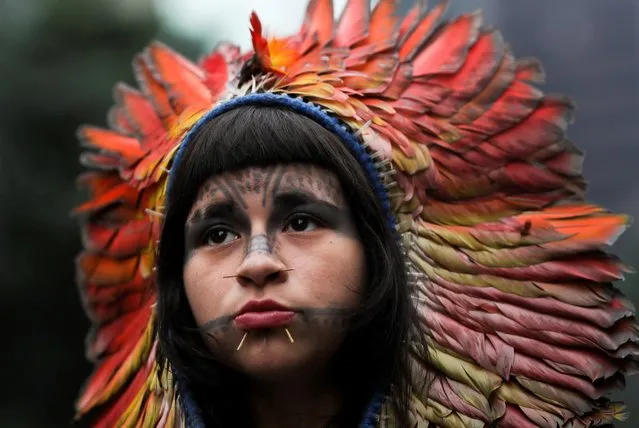 An indigenous woman takes part in a march during the International Women's Day in Sao Paulo, Brazil on March 8, 2020. (Photo by Amanda Perobelli/Reuters)