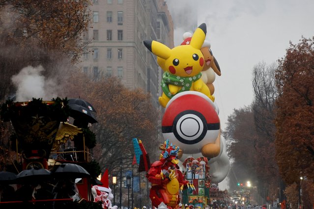 Pikachu and Eevee balloon flies during the 98th Macy's Thanksgiving Day Parade in New York City on November 28, 2024. (Photo by Eduardo Munoz/Reuters)