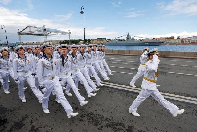 Russian sailors march during a parade marking Navy Day in Saint Petersburg, Russia on July 31, 2022. (Photo by Maxim Shemetov/Reuters)