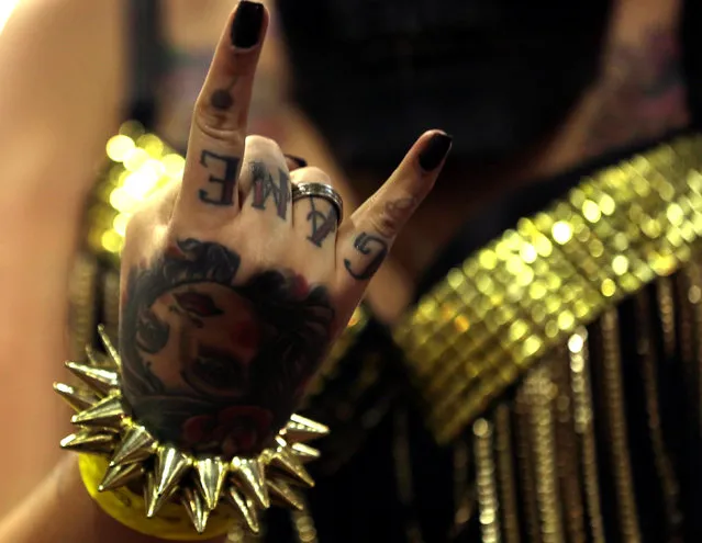 The tattooed hand of a woman is pictured during the Tattoo Week SP 2016 in Sao Paulo, Brazil, July 23, 2016. (Photo by Paulo Whitaker/Reuters)