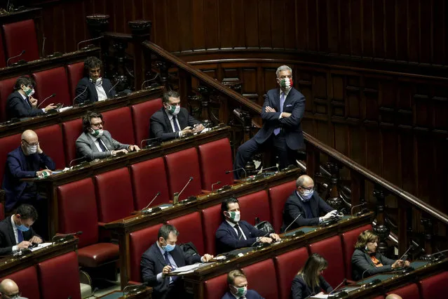 Brothers of Italy party members attend a session of the lower house of parliament on the coronavirus disease (COVID-19), in Rome, Italy on April 21, 2020. (Photo by Remo Casilli/Reuters)