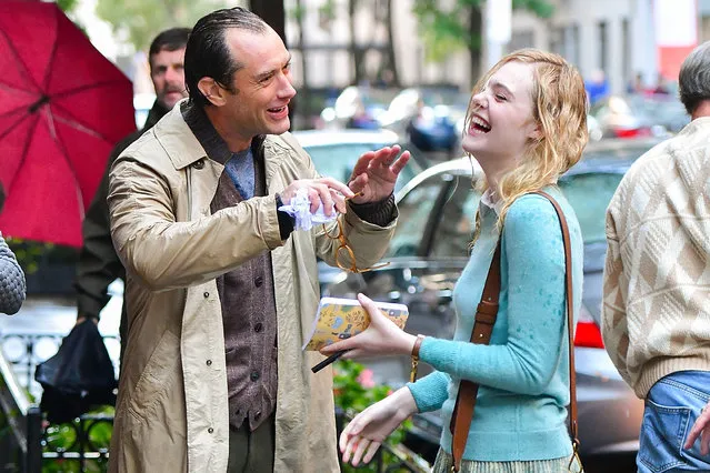 Jude Law and Elle Fanning seen on location for Woody Allen's untitled movie on October 18, 2017 in New York City. (Photo by James Devaney/GC Images)