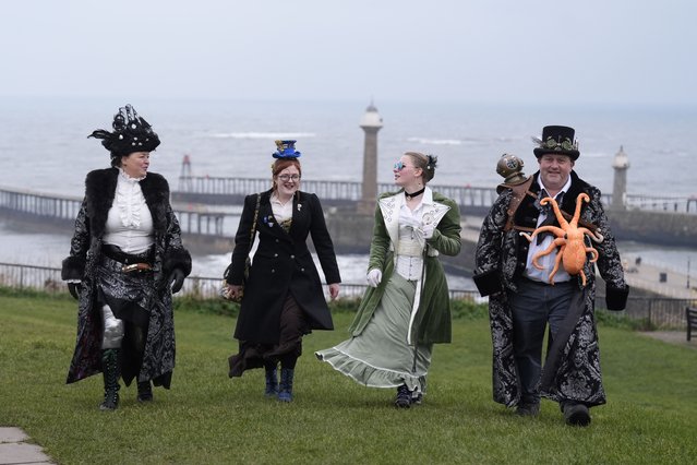 Steampunks, family members, Juliet Ashmore (left), Katrina Ashmore, John Ashmore and family friend Lottie Cocke (second left) walk together during the Whitby Steampunk Weekend, in Whitby, Yorkshire, UK on Sunday, February 9, 2025. (Photo by Danny Lawson/PA Images via Getty Images)