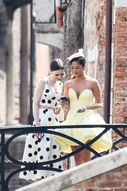 American actresses Lily Collins and Ashley Park during Emily in Paris set in Venice, Italy on August 18, 2025. (Photo by Florian Poitout/ABACAPRESS.COM)