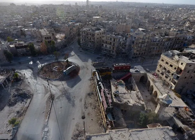 A general view taken with a drone shows the damage in the rebel-held Bab al-Hadid neighbourhood of Aleppo, Syria, October 13, 2016. (Photo by Abdalrhman Ismail/Reuters)