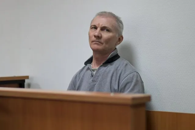Alexei Moskalyov sits in a courtroom in Yefremov, Tula region, some 300 kilometers (186 miles) south of Moscow, Russia, Monday, March 27, 2023. A court in Russia on Tuesday convicted a single father over social media posts criticizing the war in Ukraine and sentenced him to two years in prison – a case brought to the attention of authorities by his daughter's drawings against the invasion at school, according to the man's lawyer and local activists. The 54-year-old Moskalyov, a single father of a 13-year-old daughter, was accused of repeatedly discrediting the Russian army, a criminal offense in accordance to a law Russian authorities adopted shortly after sending troops into Ukraine. (Photo by AP Photo/Stringer)