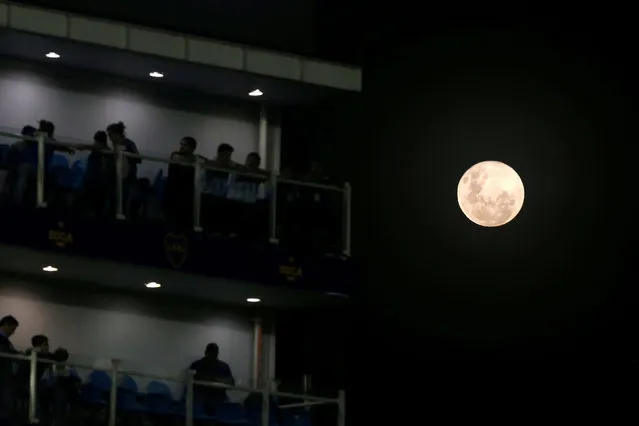 General view of the moon and fans during the international friendly soccer match between Argentina and Haiti at La Bombonera stadium in Buenos Aires, Argentina, 29 May 2018. (Photo by Agustin Marcarian/Reuters)