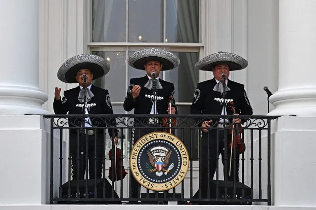 A mariachi band performs ahead of a screening of the film “Flamin' Hot” on the South Lawn of the White House in Washington, DC, June 15, 2023. (Photo by Andrew Caballero-Reynolds/AFP Photo)
