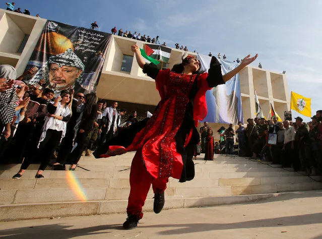 A Palestinian woman performs Dabka, a traditional dance, during a rally marking the Palestinian Declaration of Independence in 1988, in the West Bank city of Tulkarm November 14, 2016. (Photo by Abed Omar Qusini/Reuters)