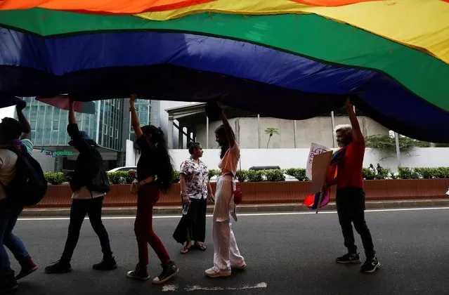 Sri Lanka's LGBTQ community members take part in a pride parade in Colombo, Sri Lanka on June 4, 2023. (Photo by Dinuka Liyanawatte/Reuters)
