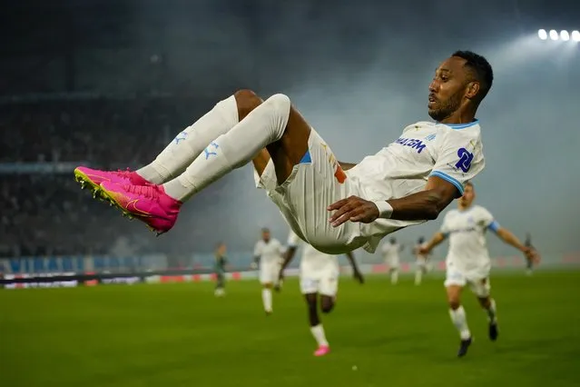 Marseille's Pierre-Emerick Aubameyang celebrates after scoring his side's opening goal during the Champions League soccer match between Marseille and Panathinaikos at the Velodrome stadium in Marseille, southern France, Tuesday, August 15, 2023. (Photo by Daniel Cole/AP Photo)