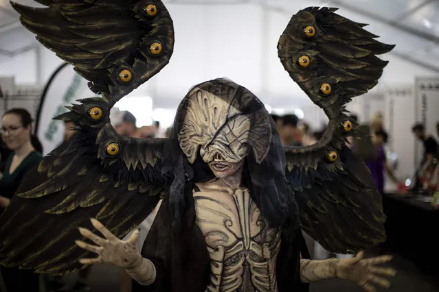 A cosplayer poses at the first ever multi- genre entertainment comic and fan convention Comi Con Africa in Johannesburg, on September 14, 2018. (Photo by Marco Longari/AFP Photo)
