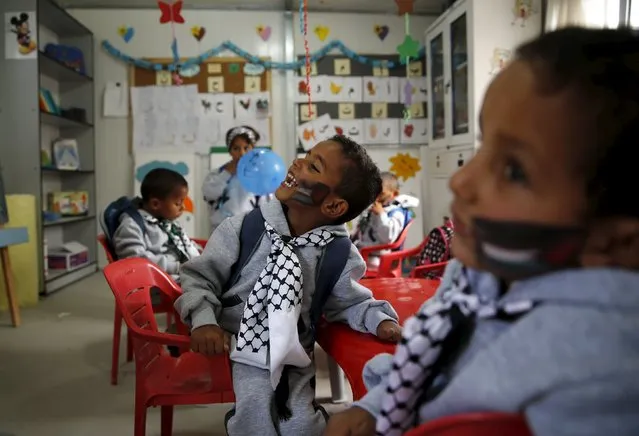 Palestinian children play inside a container used as a kindergarten near the West Bank city of Jericho December 3, 2015. (Photo by Ammar Awad/Reuters)