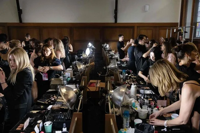 Models prepare backstage ahead of the the Spring Summer 2024 runway show for LoveShackFancy during New York Fashion Week in New York on September 12, 2023. (Photo by Yuki Iwamura/AFP Photo)