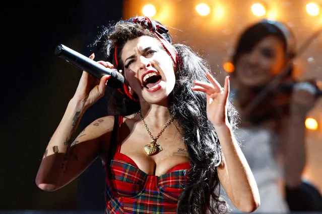 British singer Amy Winehouse performs at the Brit Awards at Earls Court in London on February 20, 2008. (Photo by Alessia Pierdomenico/Reuters)