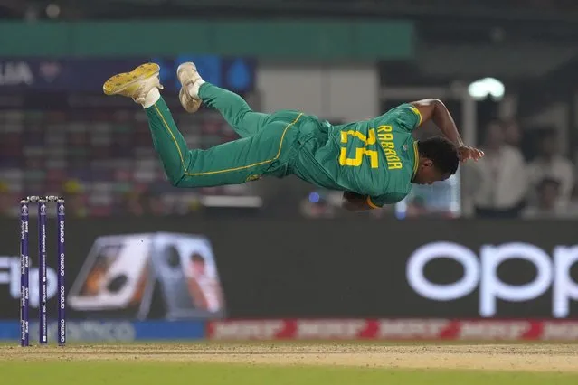 South Africa's Kagiso Rabada looses his balance after a delivery during the ICC Men's Cricket World Cup second semifinal match between Australia and South Africa in Kolkata, India, Thursday, November 16, 2023. (Photo by Bikas Das/AP Photo)