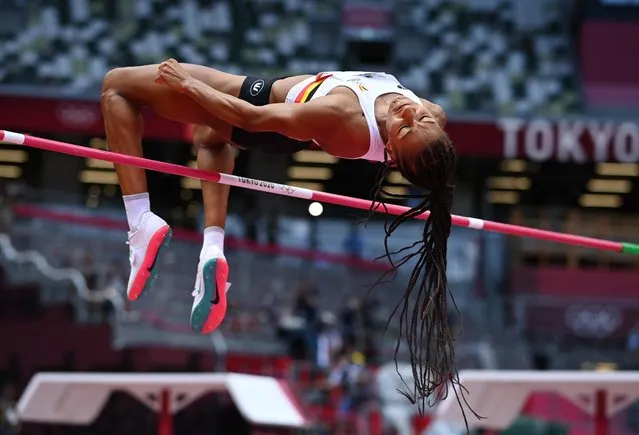 Belgium's Nafissatou Thiam competes in the women's heptathlon high jump during the Tokyo 2020 Olympic Games at the Olympic Stadium in Tokyo on August 4, 2021. (Photo by Dylan Martinez/Reuters)