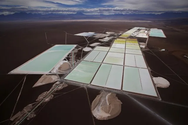 An aerial view of the brine pools and processing areas of the Rockwood lithium plant on the Atacama salt flat, the largest lithium deposit currently in production, in the Atacama desert of northern Chile, January 10, 2013. (Photo by Ivan Alvarado/Reuters)