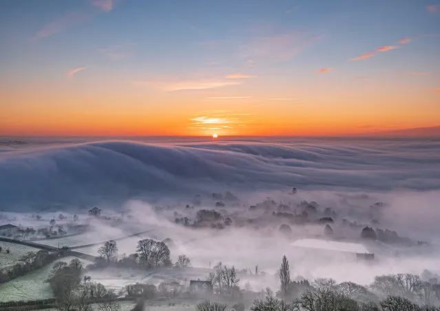 “Mists of Avalon”. A view of Glastonbury, UK, on cold January morning from Glastonbury Tor at sunrise. (Photo by Michelle Cowbourne/Royal Meteorological Society’s Weather Photographer of the Year Awards)