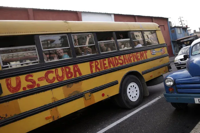 A bus with members of Pastors for Peace, a U.S.-based group opposed to the U.S. economic embargo against Cuba, drives through Havana, Cuba March 18, 2016. (Photo by Ueslei Marcelino/Reuters)