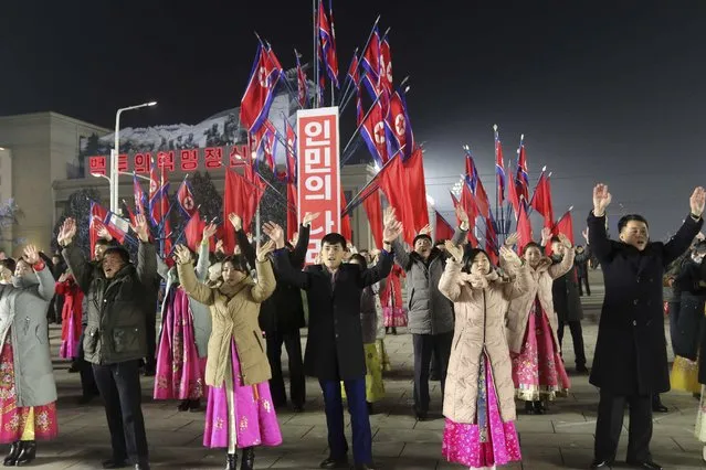 People attend the New Year's eve gala of youth and students at Kim Il Sung Square in Pyongyang, North Korea Sunday, December 31, 2023. (Photo by Jon Chol Jin/AP Photo)