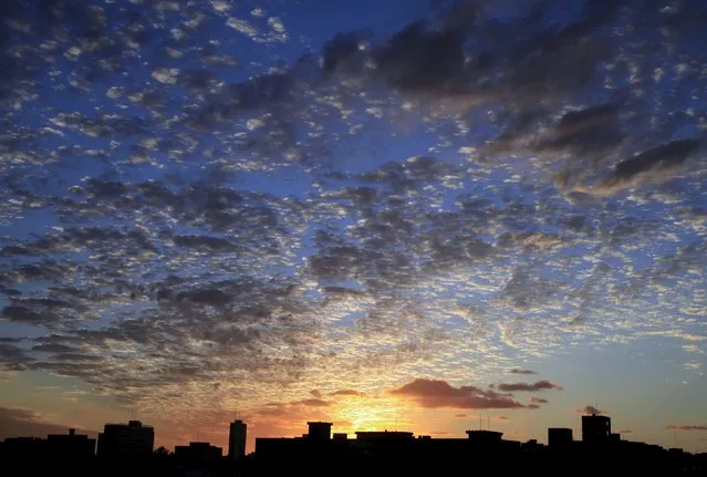 Clouds gather over Havana at sunset February 11, 2016. (Photo by Enrique de la Osa/Reuters)