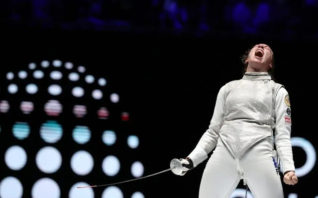 France’s Pauline Ranvier reacts after winning against Italy’s Arianna Errigo in the Women's Foil event at the 2019 Fencing World Championships in Budapest, Hungary on July 19, 2019. (Photo by Peter Kohalmi/AFP Photo)