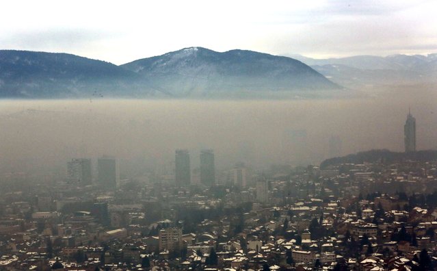 A general view of the surroundings of the city of Sarajevo, Bosnia and Herzegovina, 05 February 2022. With 217 AQI (Air Quality Index), Sarajevo is one of the most polluted cities in the world. (Photo by Fehim Demir/EPA/EFE)
