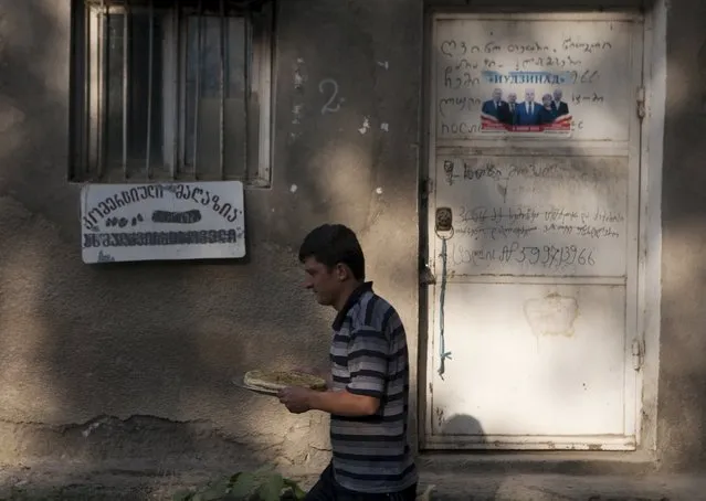 A man walks in a street in Leningori (or Akhalgori), in the breakaway region of South Ossetia, Georgia, July 6, 2015. (Photo by Kazbek Basaev/Reuters)